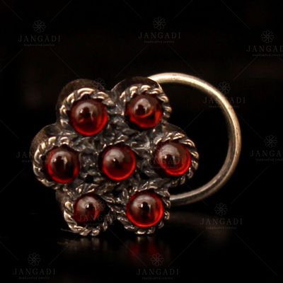 OXIDIZED SILVER FLORAL NOSE PIN WITH GARNET STONE