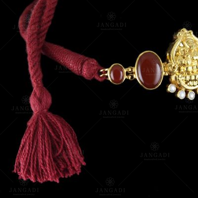 Gold Plated God Design Vanki Bajubgand Studded Red Onyx And Pearls