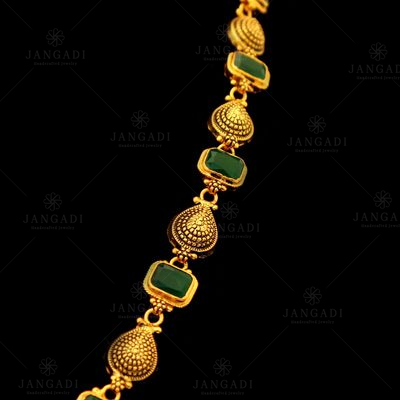 GOLD PLATED LAKSHMI RED AND GREEN CORUNDUM NECKLACE