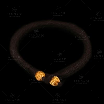 GOLD PLATED BALLS IN THREAD BRACELETS