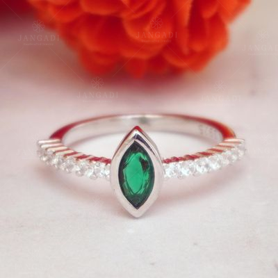 92.5 STERLING SILVER GREEN STONE AND CZ RING