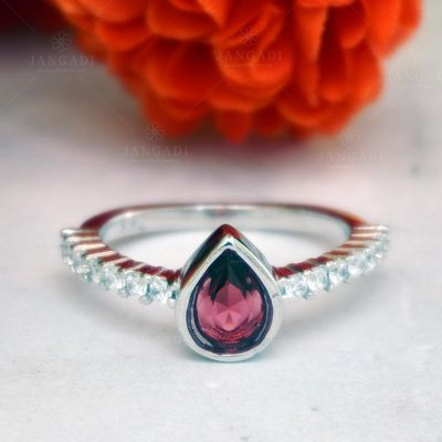 92.5 STERLING SILVER RED STONE AND CZ RING