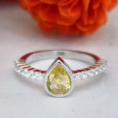 92.5 STERLING SILVER TOPAZ AND CZ RING